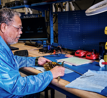 Miramar technician at desk