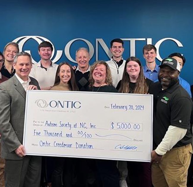 Ontic presents cheque to Autism Society