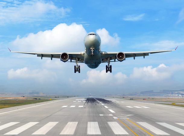 Daily view runway airport of the clouds nd the airplane flies up rapidly into the sky.