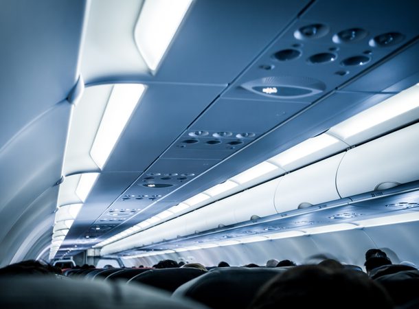 Blurred image of airplane interior in blue color filter